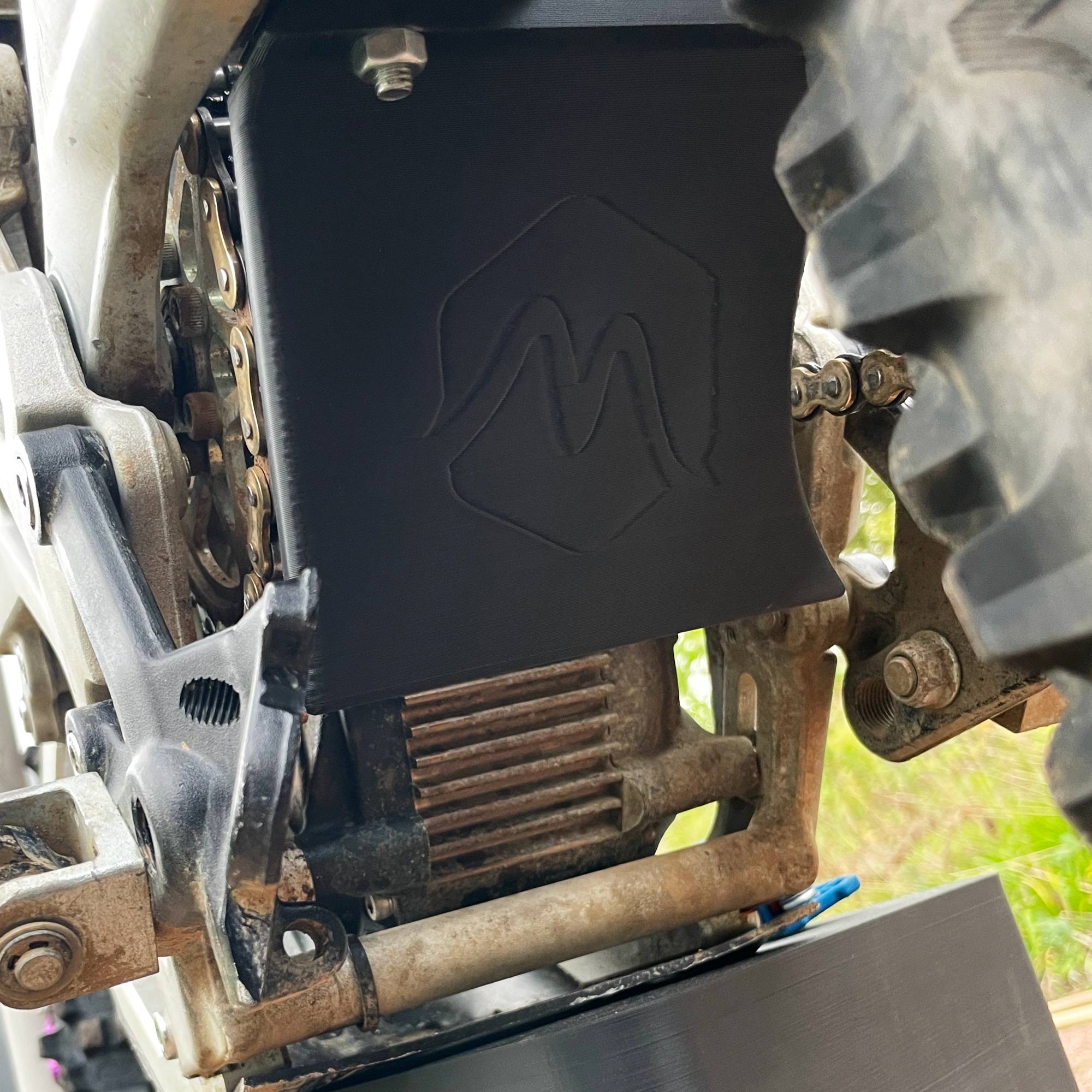surron lb belt protector on bike
